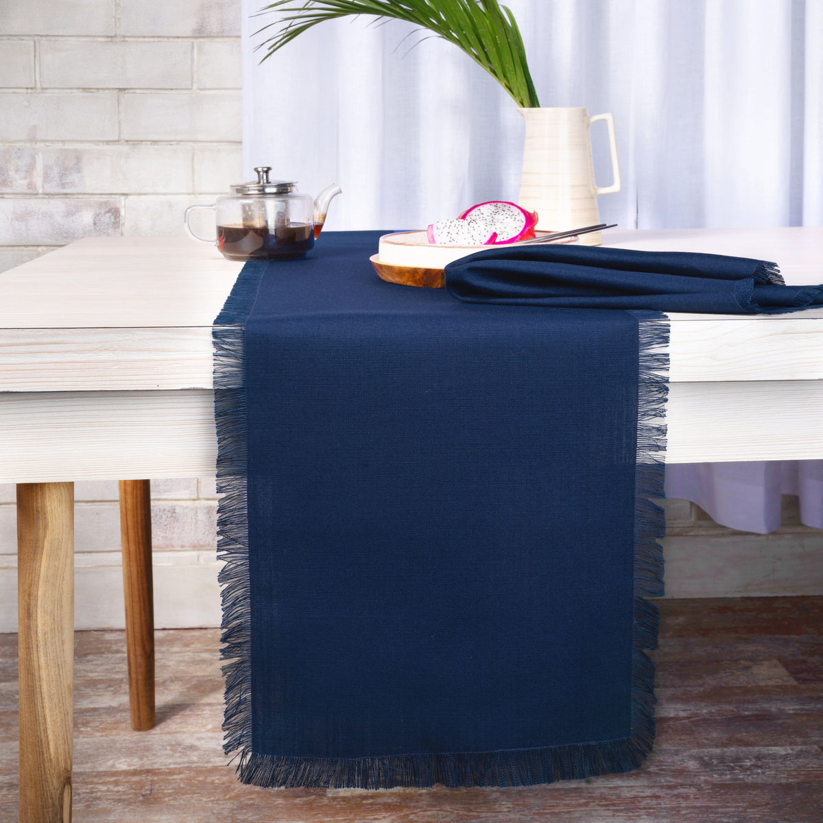 Navy blue faux linen table runner with fringed edge, 14 x 36 inches