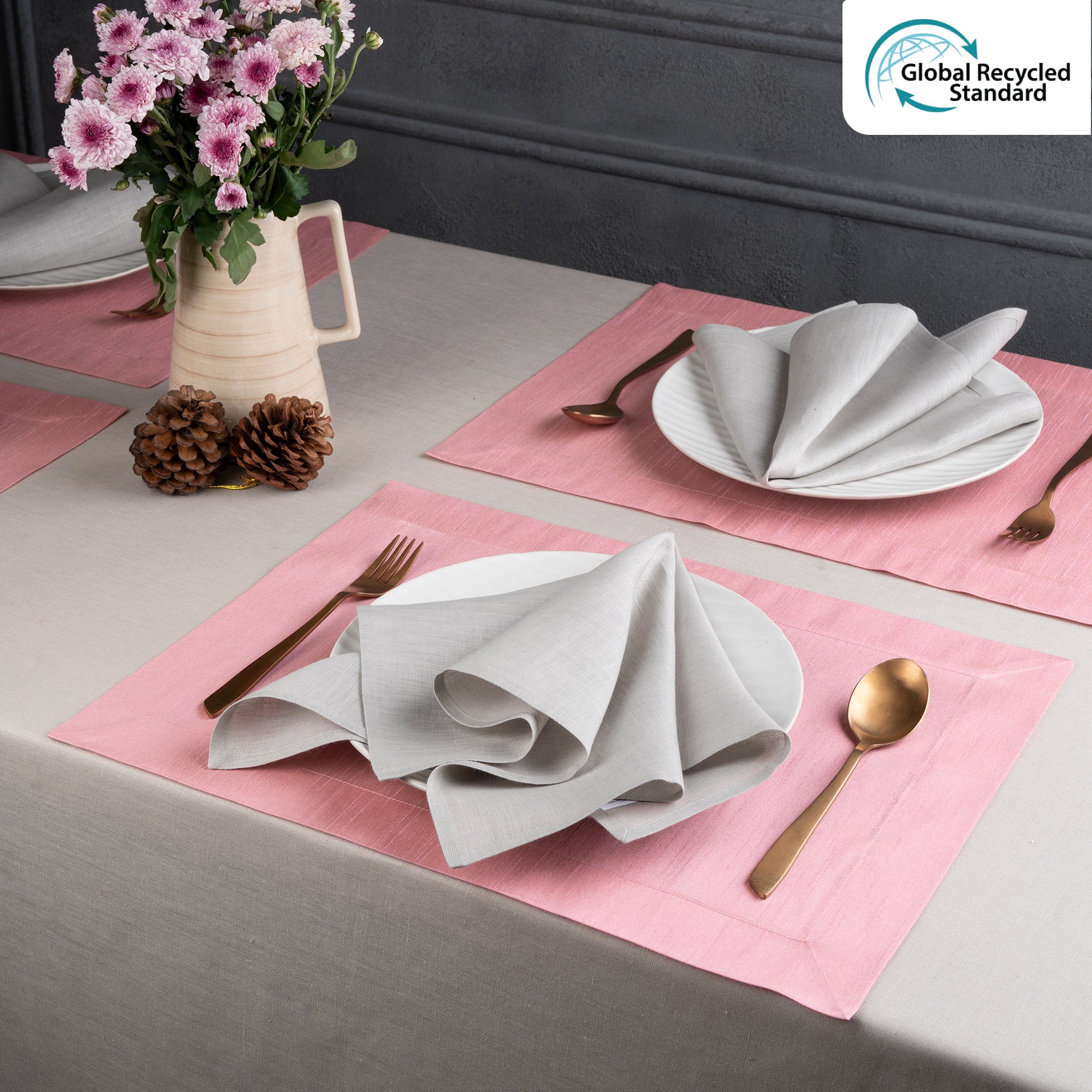 Pink Luxe Shine placemats styled on a dining table