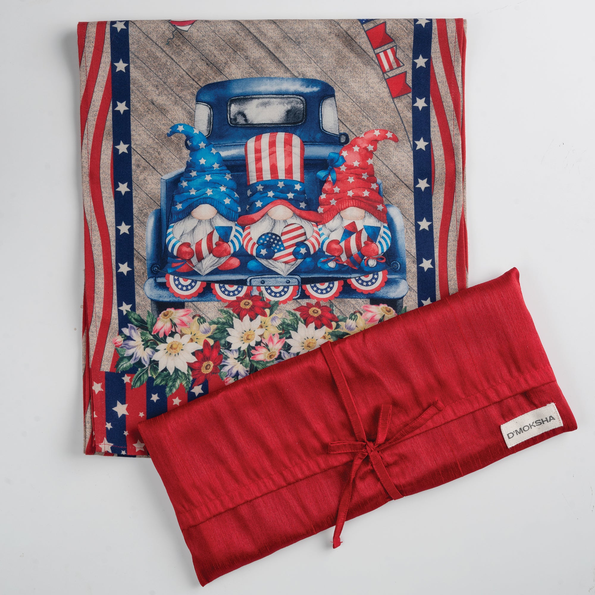Farmtruck gnomes july linen table runner folded to show fabric texture