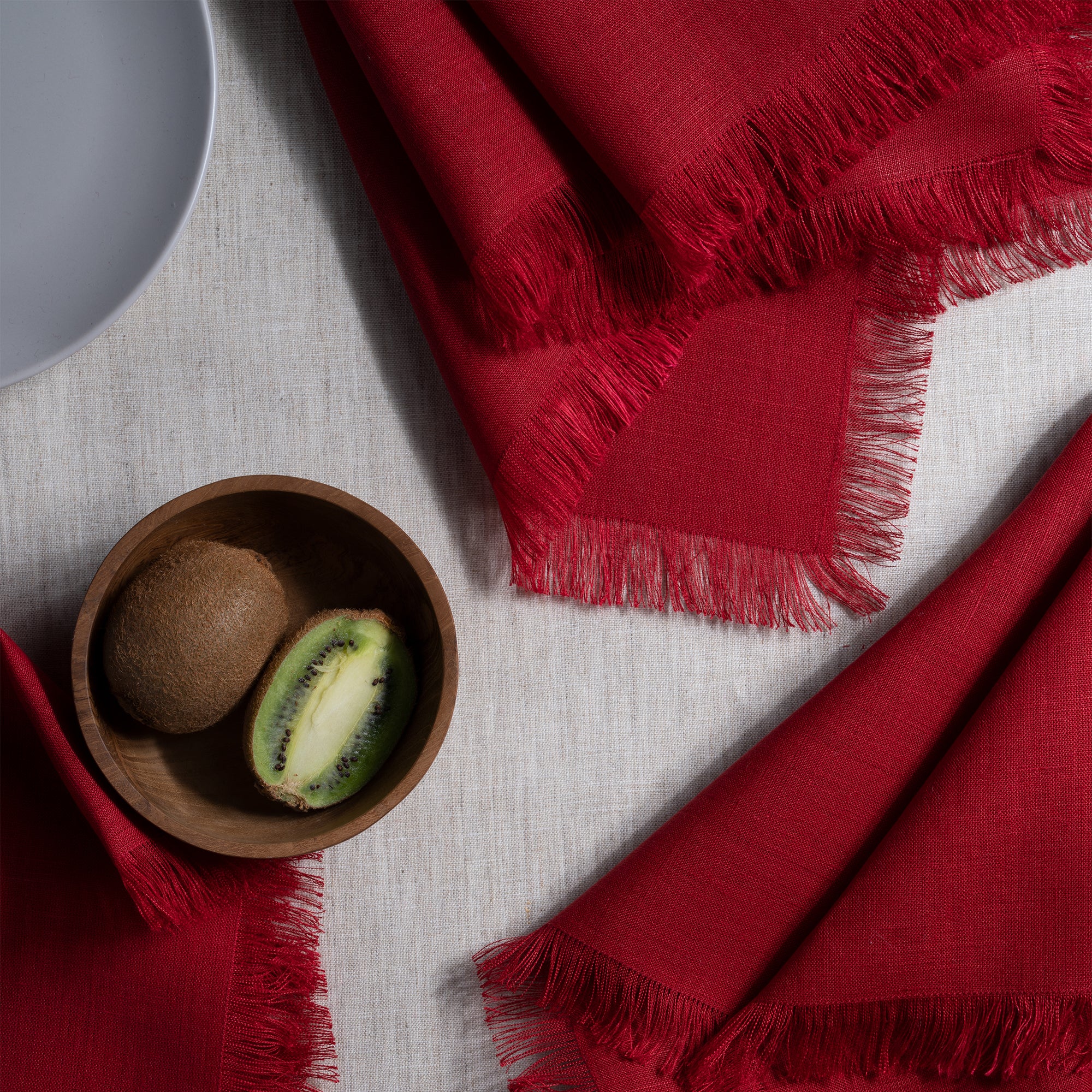 Red pure linen dinner napkins with matching D'Moksha table linens