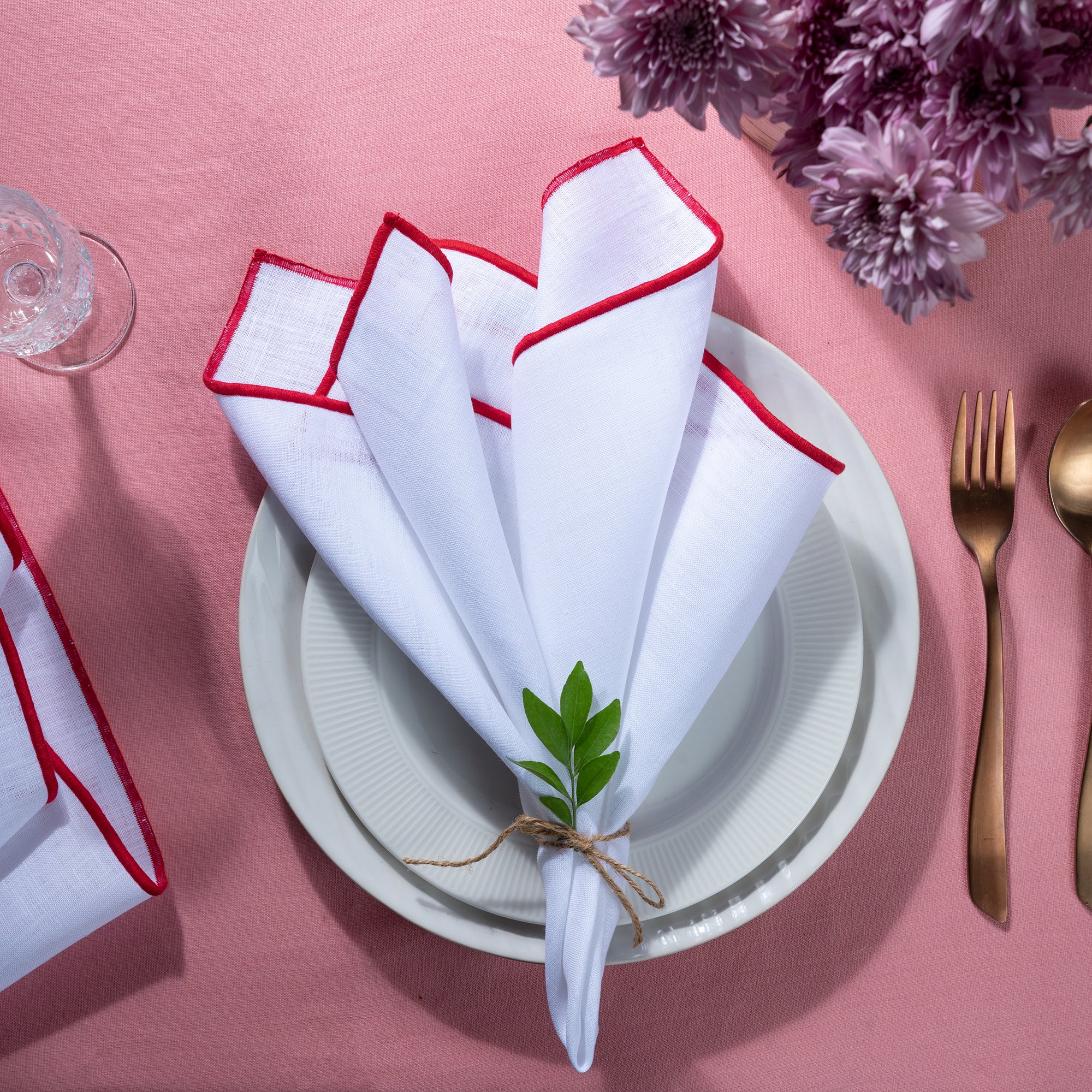 White and red pure linen dinner napkins with matching D'Moksha table linens