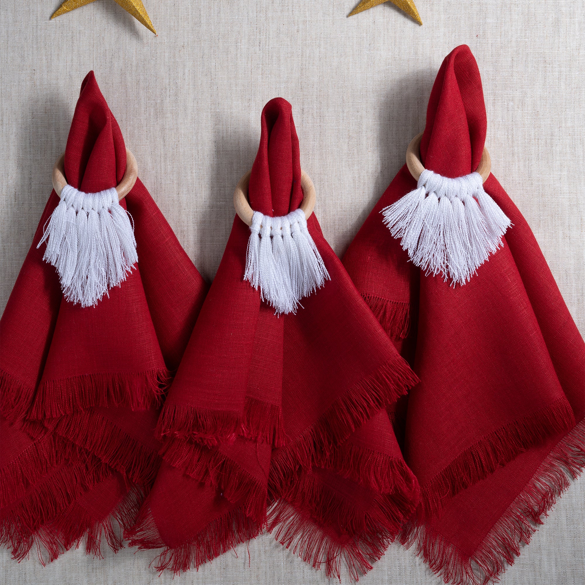 Close-up of the fringed edge on red pure linen dinner napkins