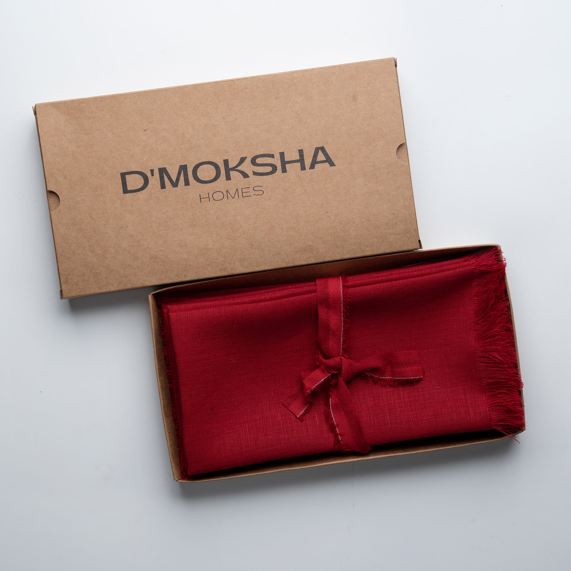 Red pure linen dinner napkins in a set table setting