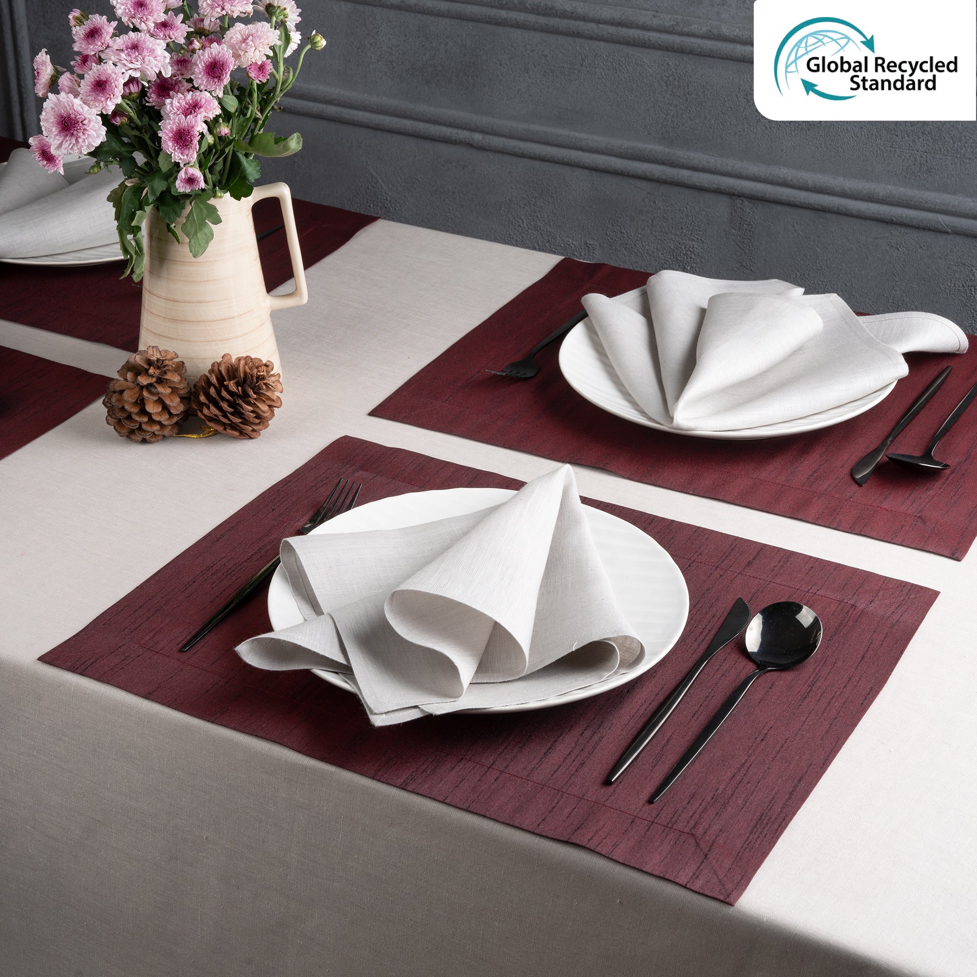 Wine red Luxe Shine placemats styled on a dining table