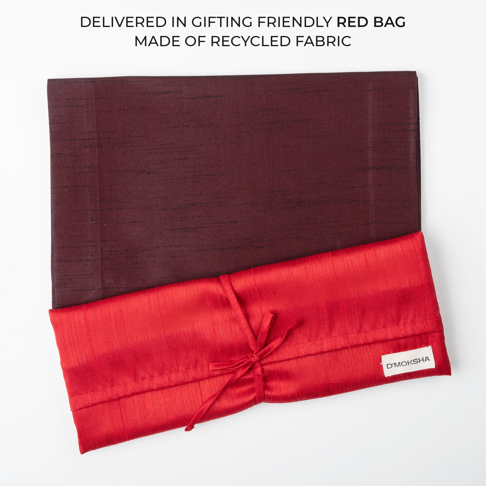 Wine red Luxe Shine placemats with matching D'Moksha table linens
