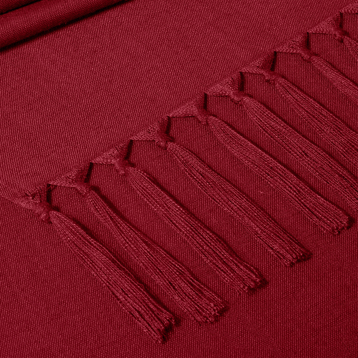 Close-up of the weave on a red faux linen table runner