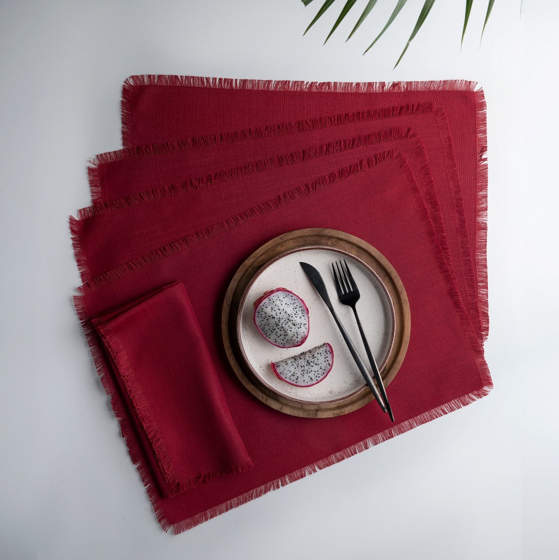 Red faux linen placemats with fringed edge, 14 x 19 inches, set of 4