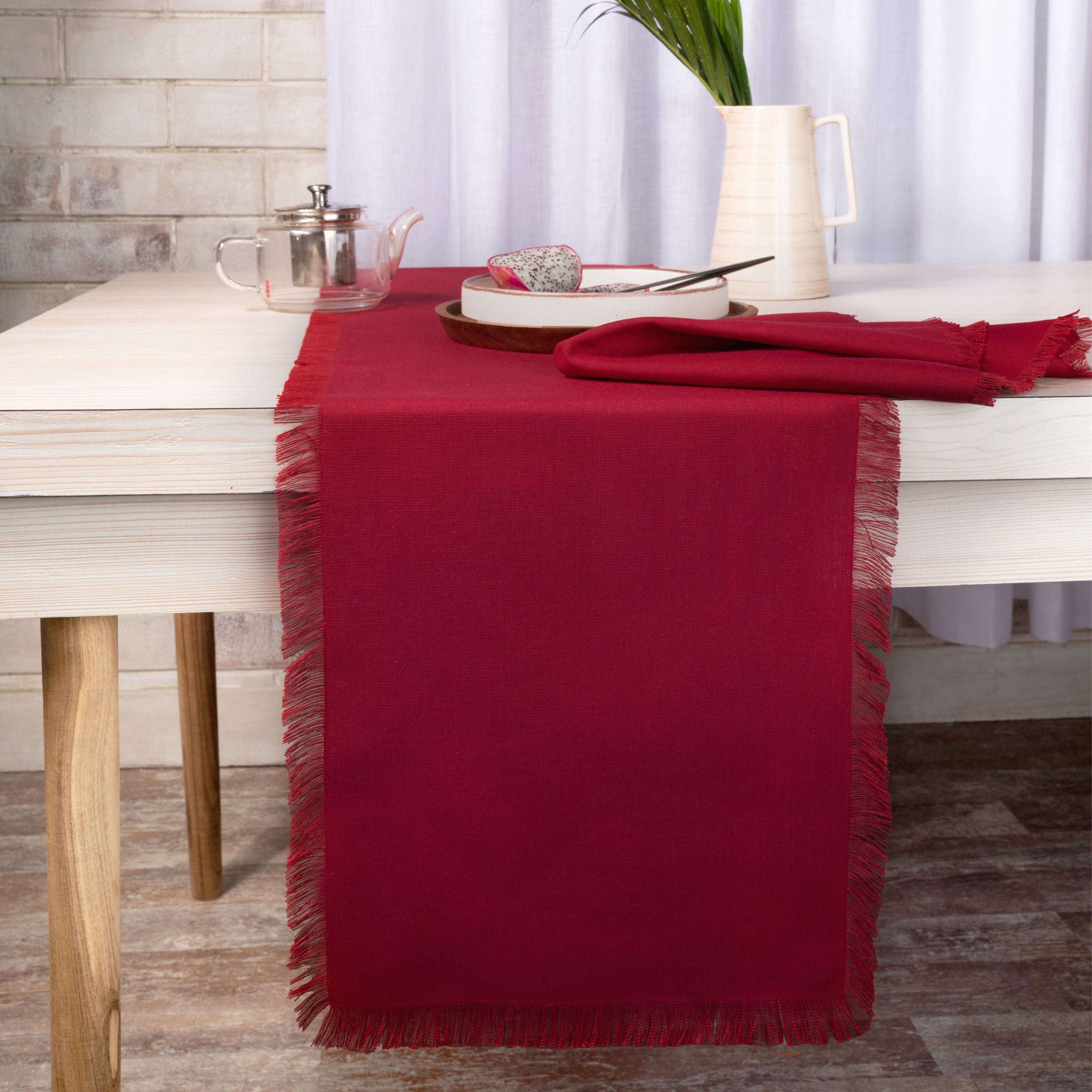Red linen table runner with fringed edge, 14 x 36 inches