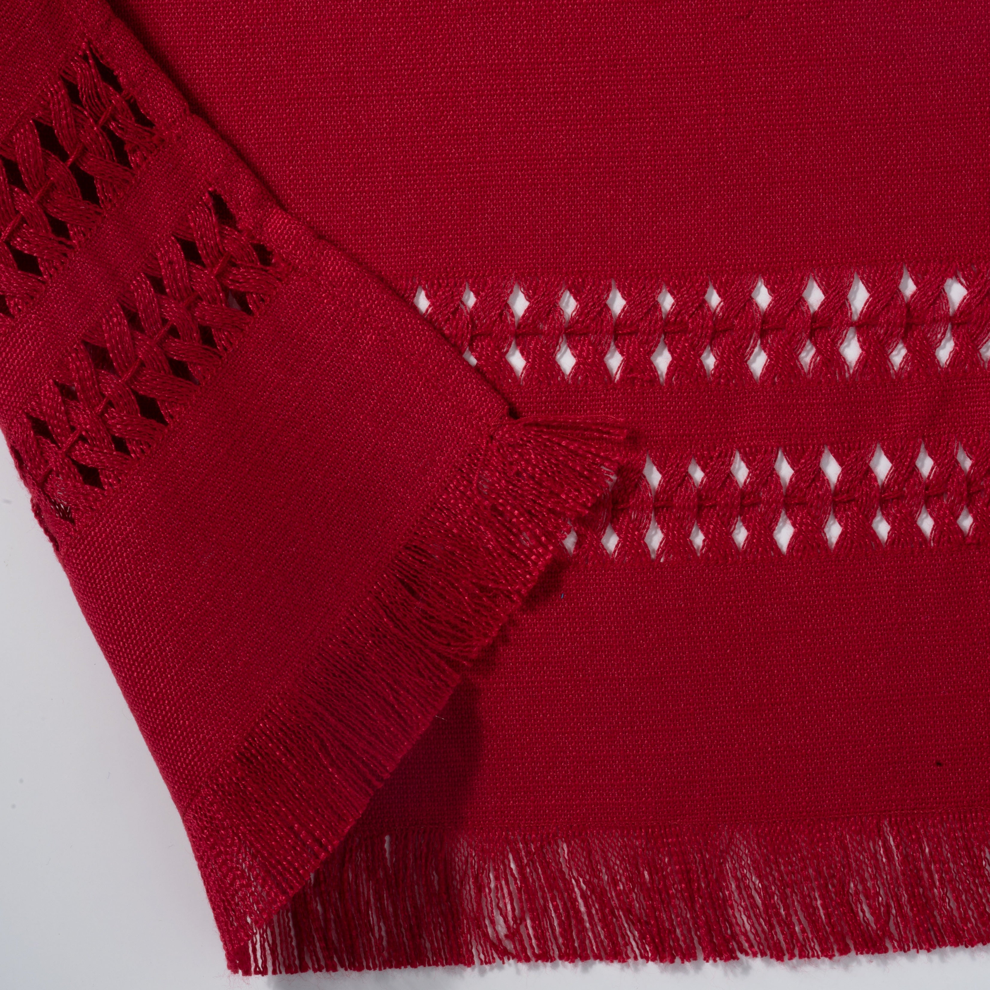 Red faux linen table runner with matching D'Moksha table linens