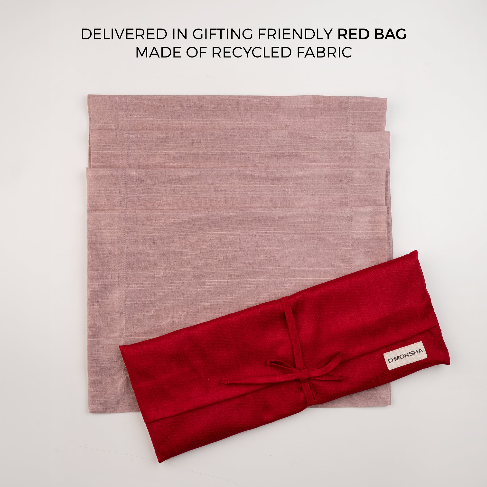 Rose gold Luxe Shine placemats with matching D'Moksha table linens