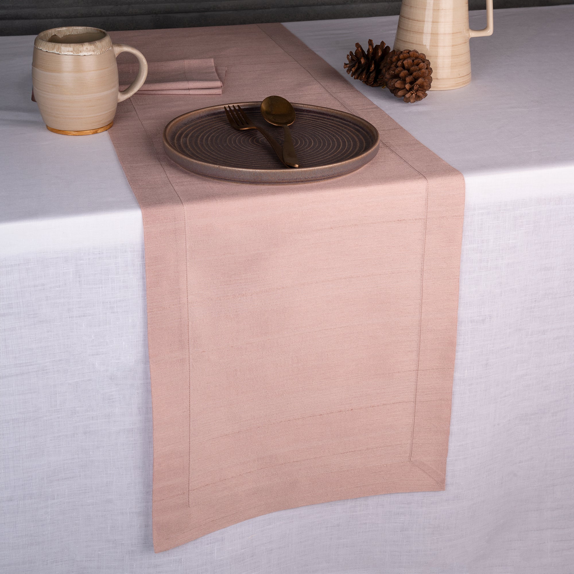 Rose gold Luxe Shine table runner with mitered corners, 14 x 36 inches