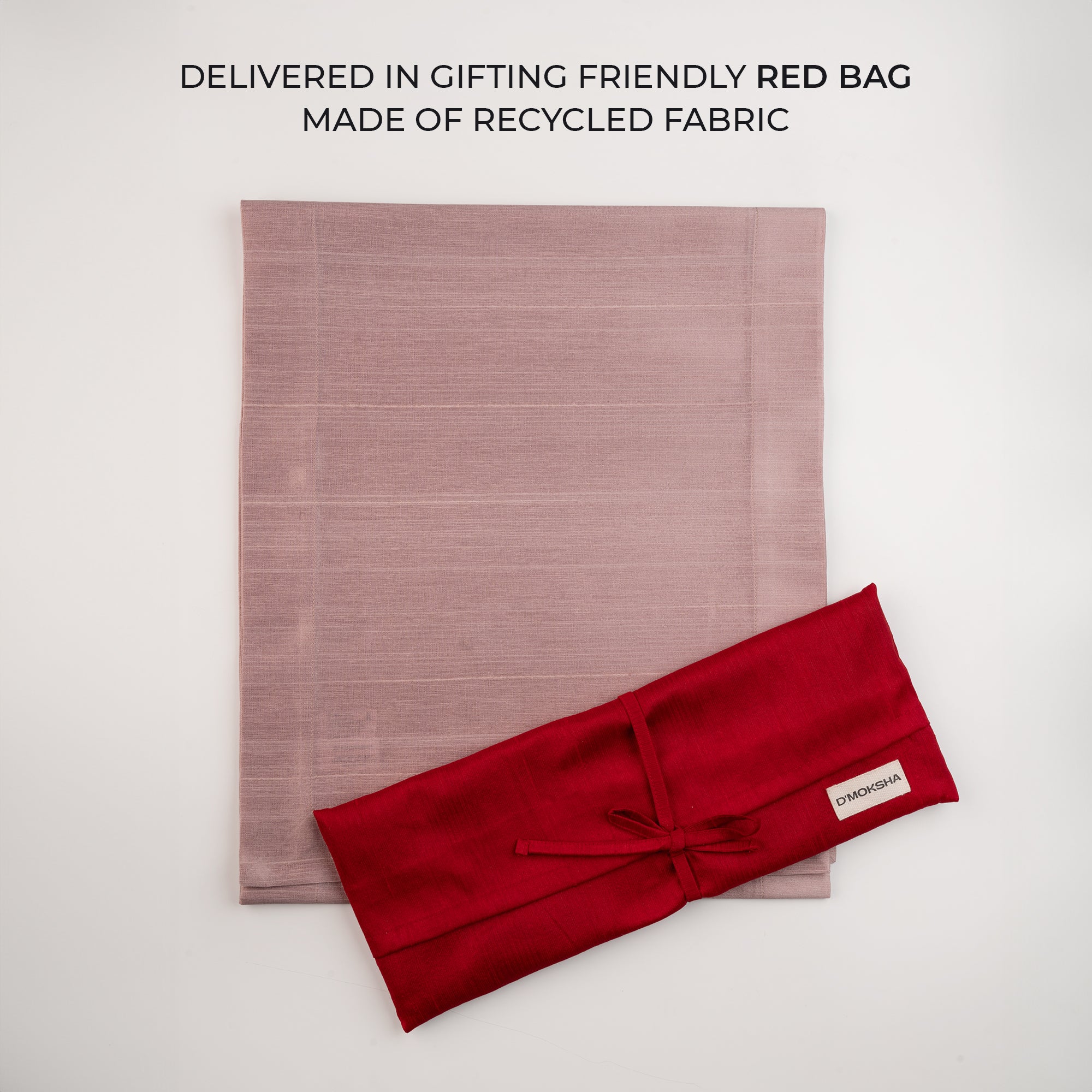Rose gold Luxe Shine table runner folded to show fabric texture
