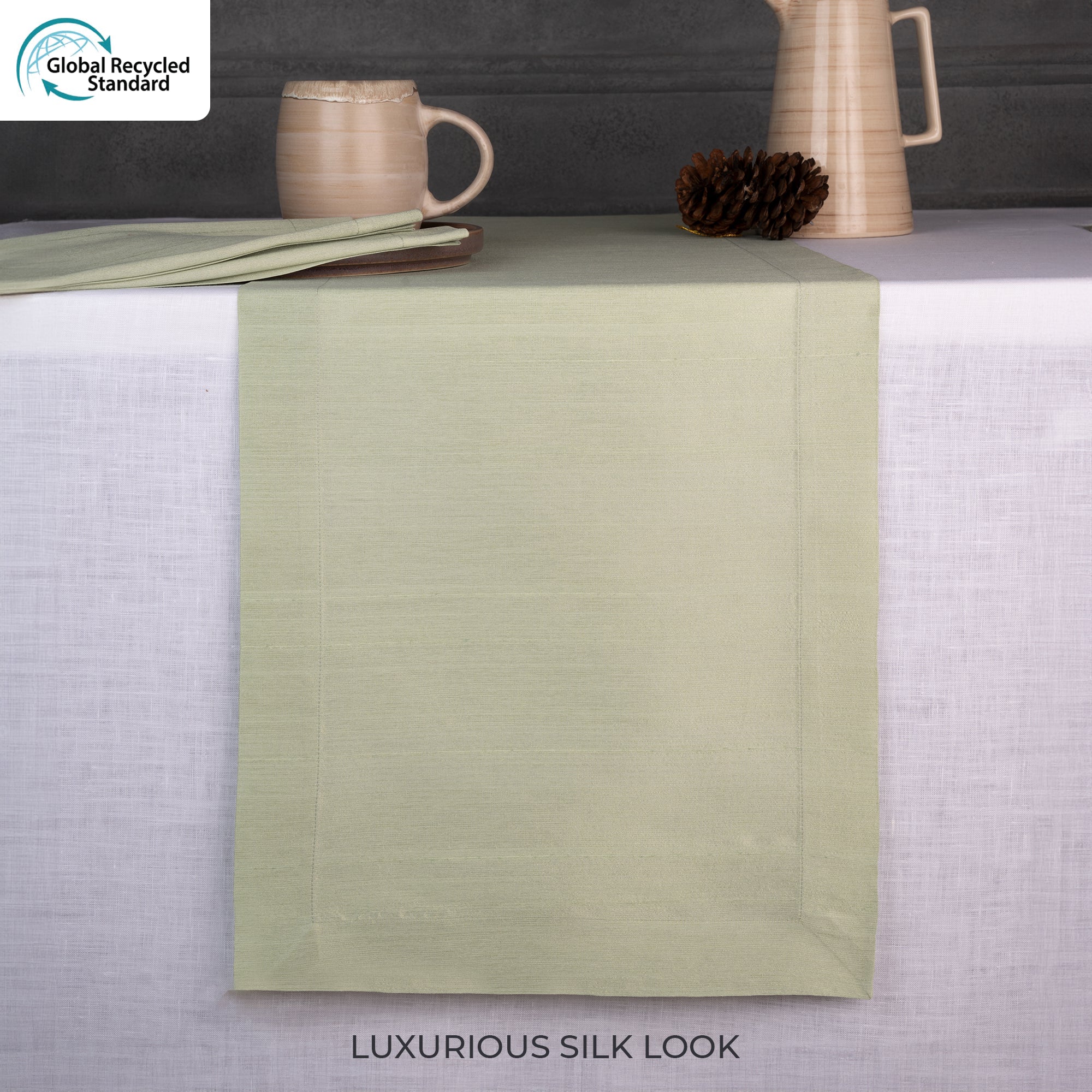 Sage green Luxe Shine table runner styled on a dining table