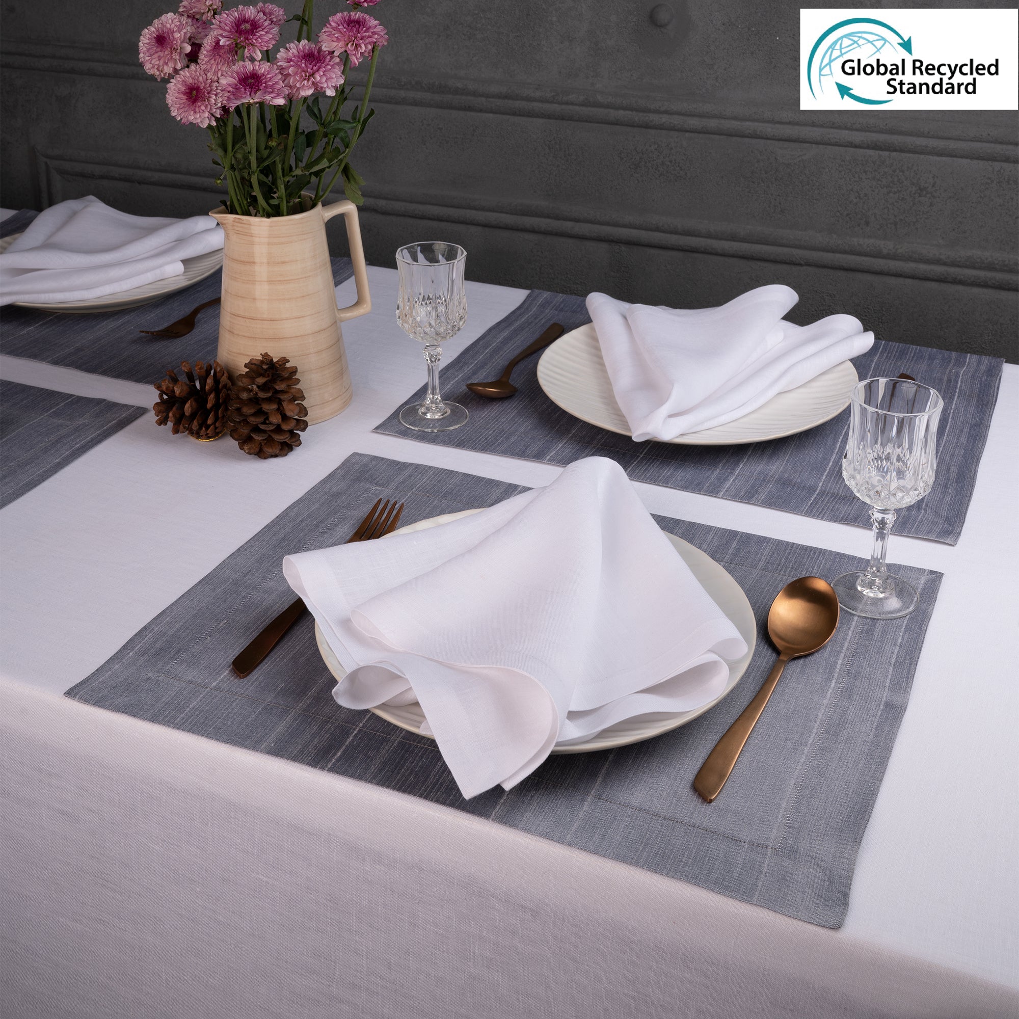 Steel grey Luxe Shine placemats styled on a dining table