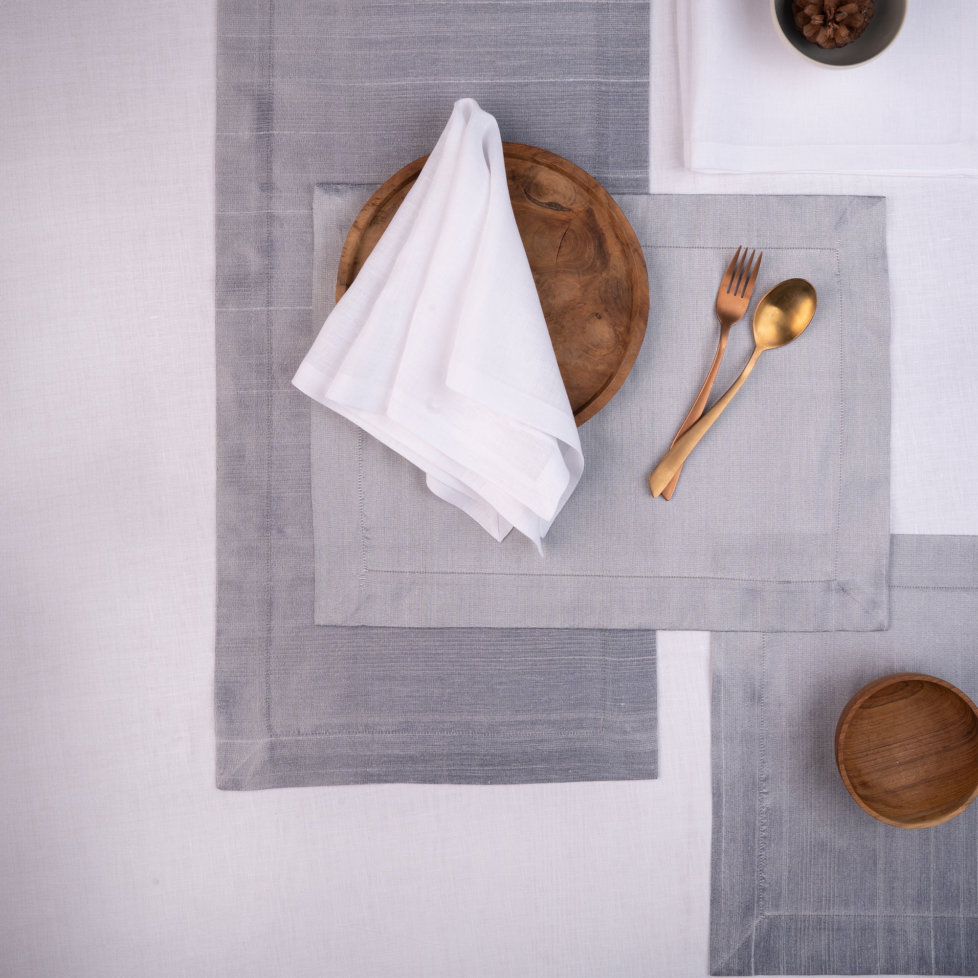 Steel grey Luxe Shine table runner with matching D'Moksha table linens