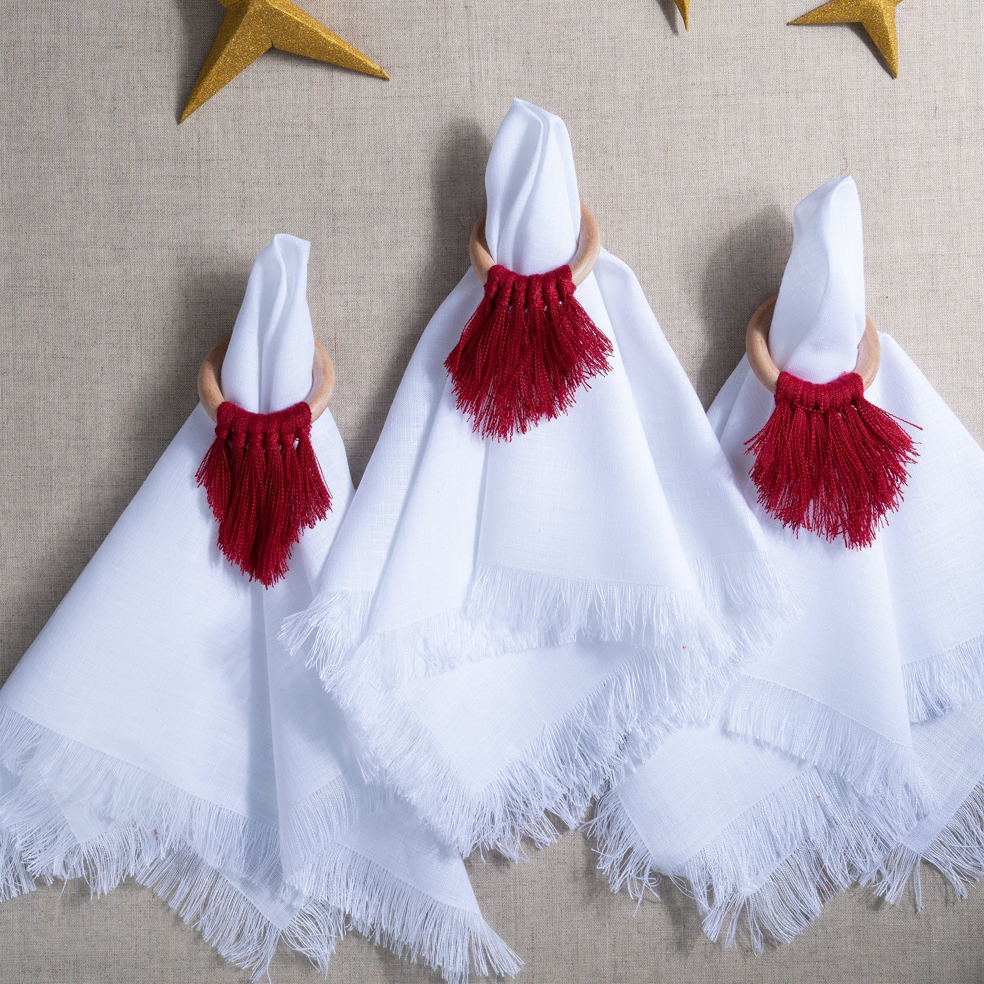 White pure linen dinner napkins with matching D'Moksha table linens