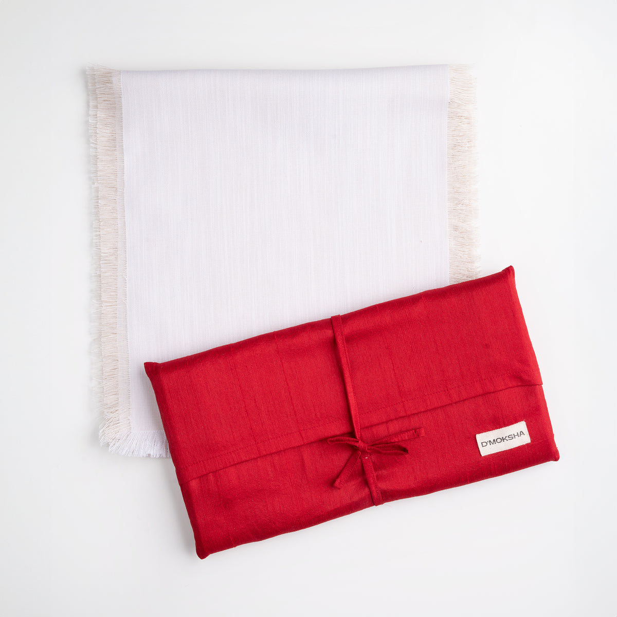 Chambray cream and white faux linen table runner folded to show fabric texture