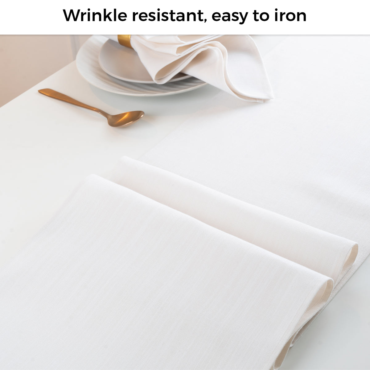 Chambray cream and white faux linen table runner folded to show fabric texture