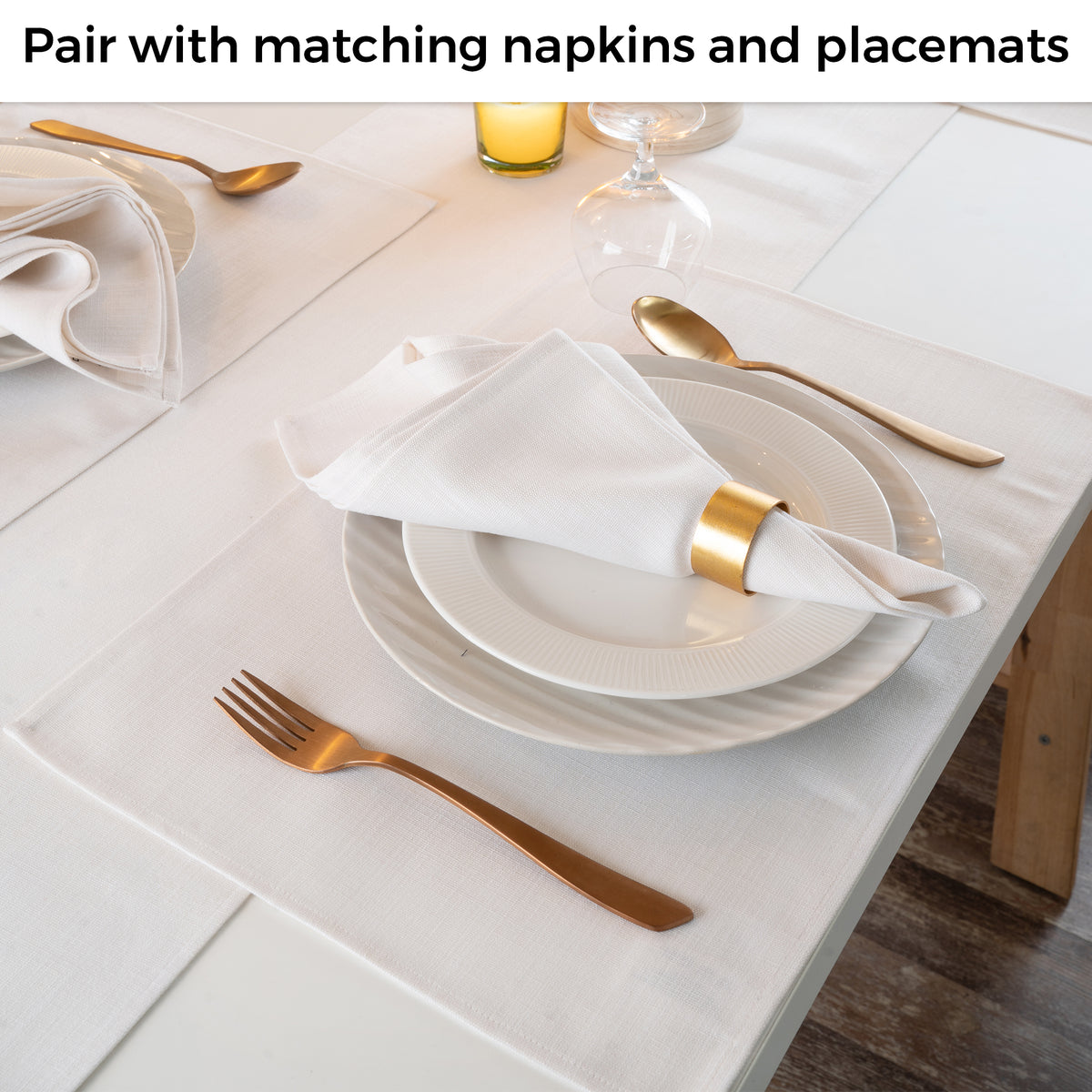 Chambray cream and white faux linen table runner in a set table setting